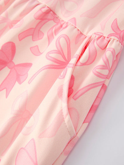 Girls Pink Bow Print Long Sleeve Jumpsuit