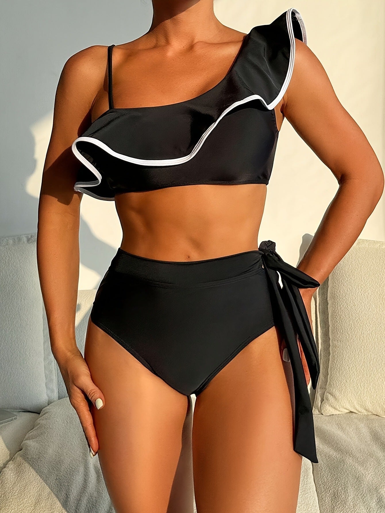 Bikini split swimsuit solid color black shoulder lotus leaf edge