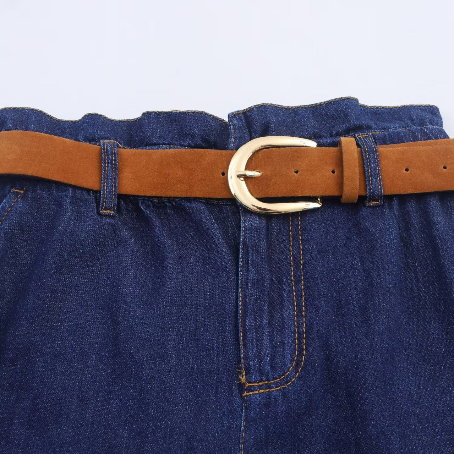 Paired with waistband and paper bag shorts