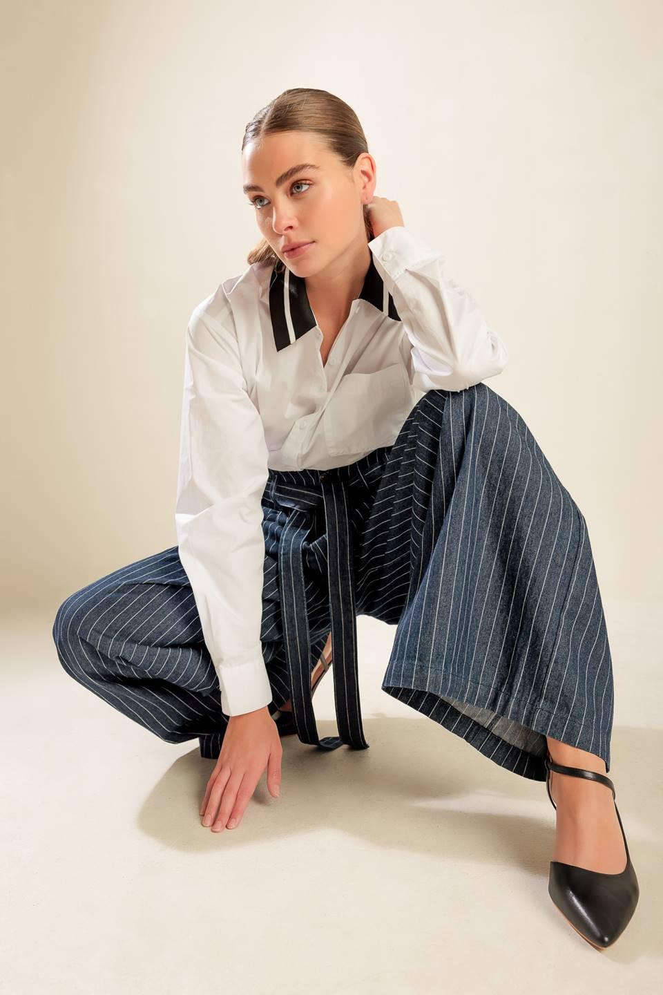 Cause a Commotion Woven Top