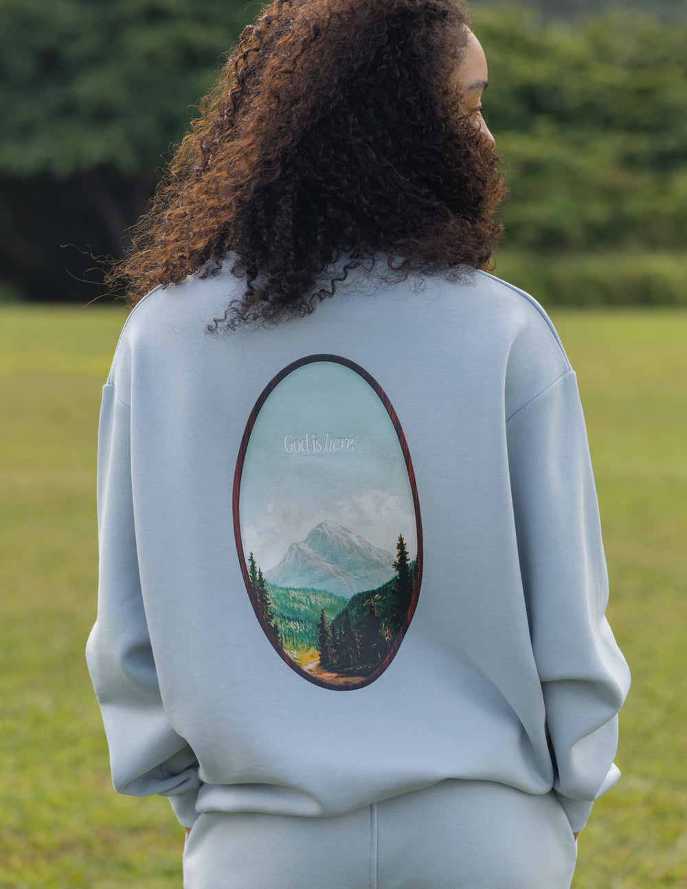 Elevated Faith God Is Here Unisex Crewneck