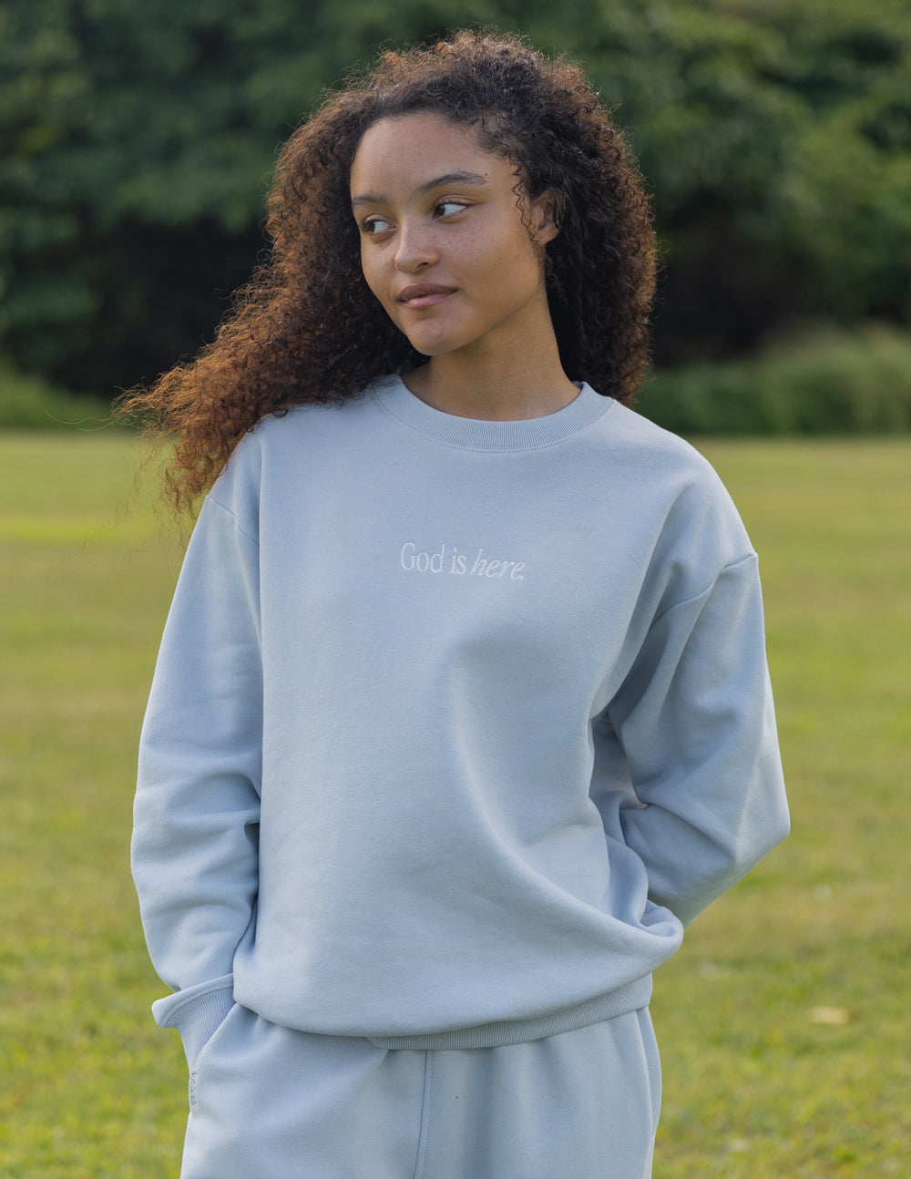 Elevated Faith God Is Here Unisex Crewneck