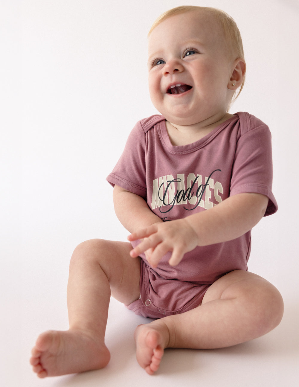 Elevated Faith God of Miracles Onesie
