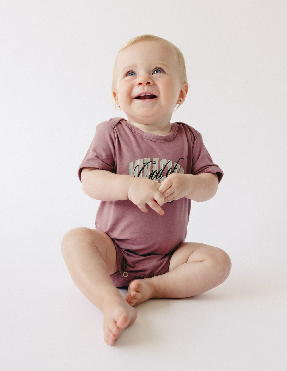Elevated Faith God of Miracles Onesie