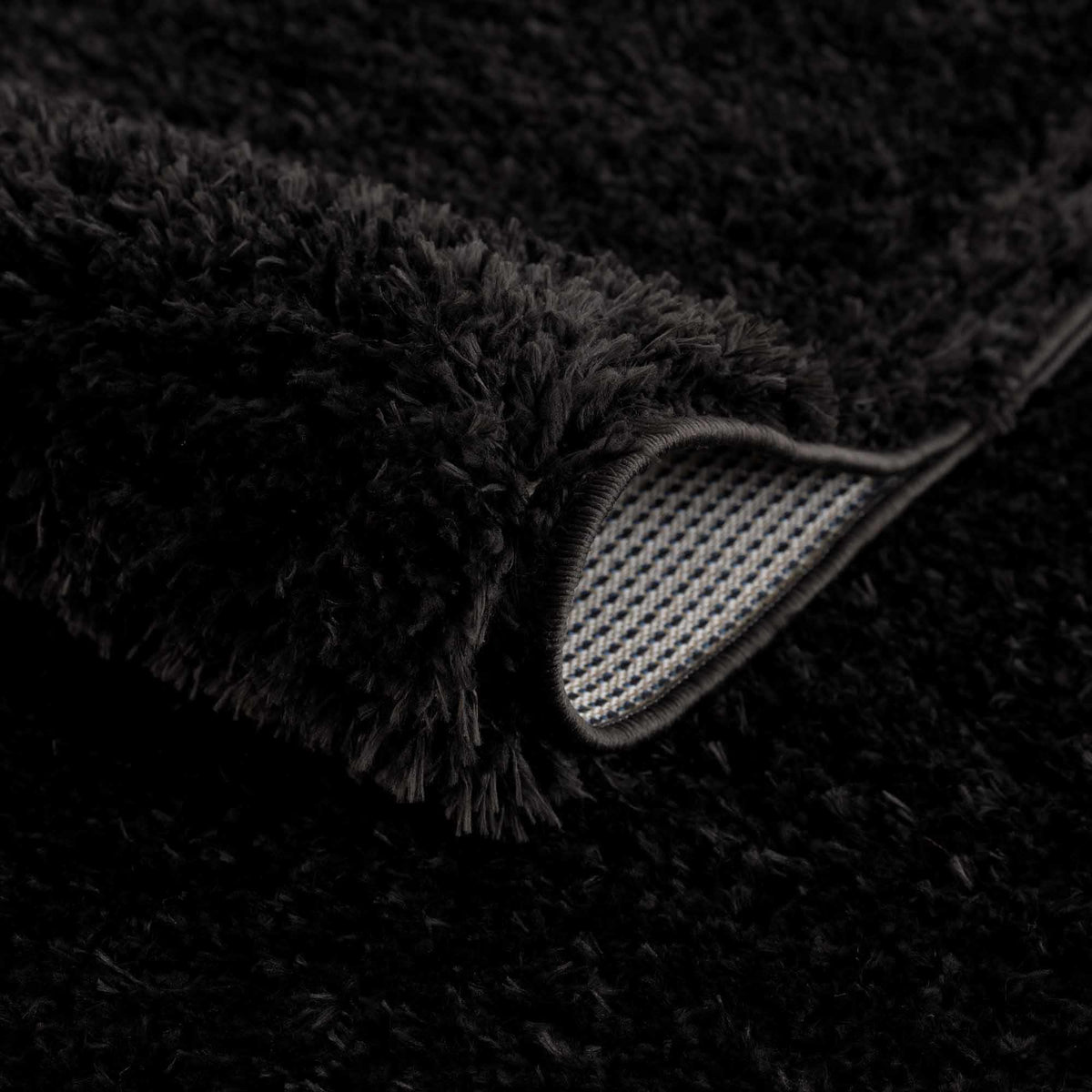 Faina Solid Black Shag Washable Area Rug