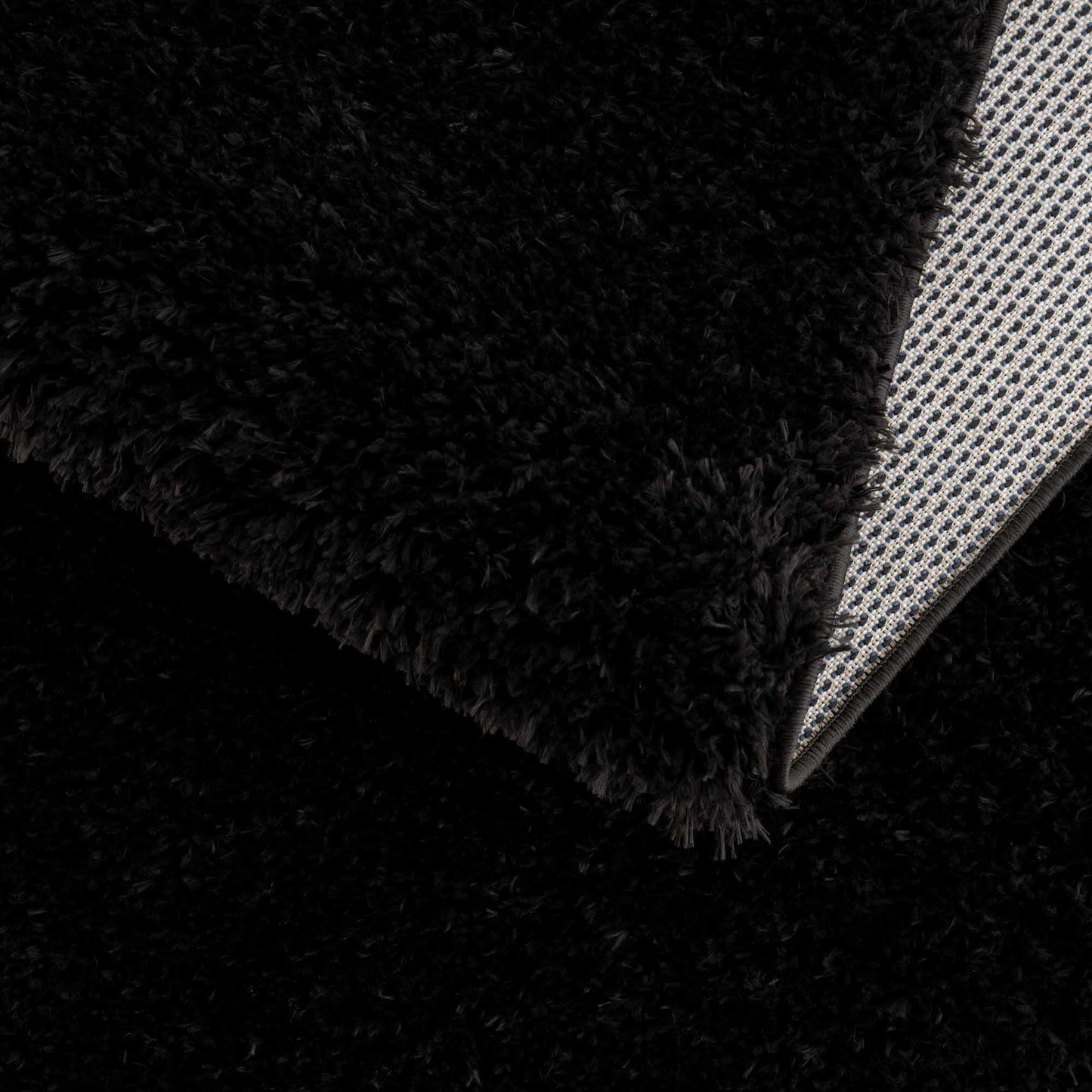 Faina Solid Black Shag Washable Area Rug