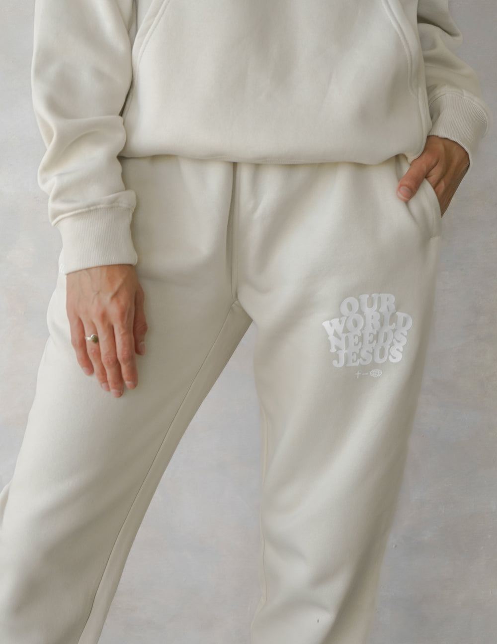 Elevated Faith Our World Needs Jesus Beige Unisex Sweatpant