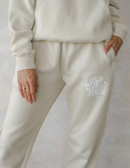 Elevated Faith Our World Needs Jesus Beige Unisex Sweatpant
