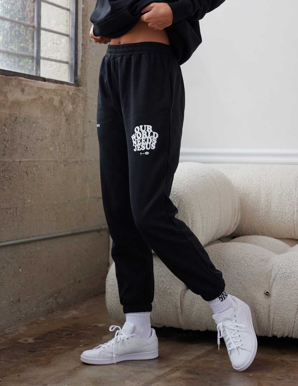 Elevated Faith Our World Needs Jesus Black Unisex Sweatpant