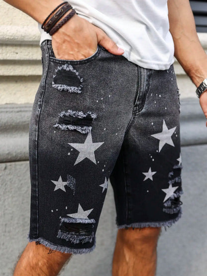 Men's summer denim printed shorts. Black - grey gradient color. Ripped details. Street - style trend.
