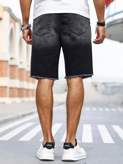 Men's summer denim printed shorts. Black - grey gradient color. Ripped details. Street - style trend.