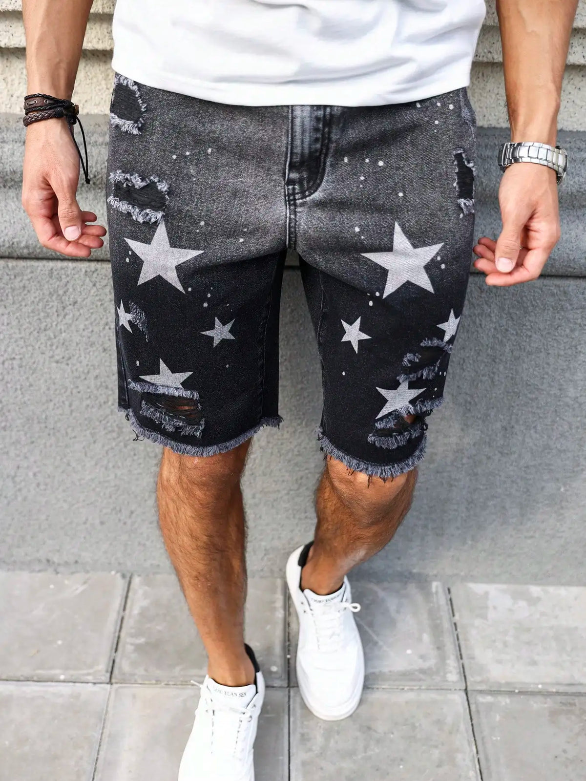 Men's summer denim printed shorts. Black - grey gradient color. Ripped details. Street - style trend.