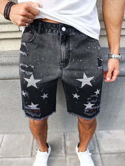 Men's summer denim printed shorts. Black - grey gradient color. Ripped details. Street - style trend.