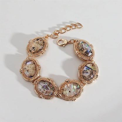 Abalone Shell & Goldtone Oval Station Bracelet