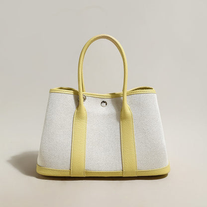 Carefree Canvas and Leather Top Handle Bag