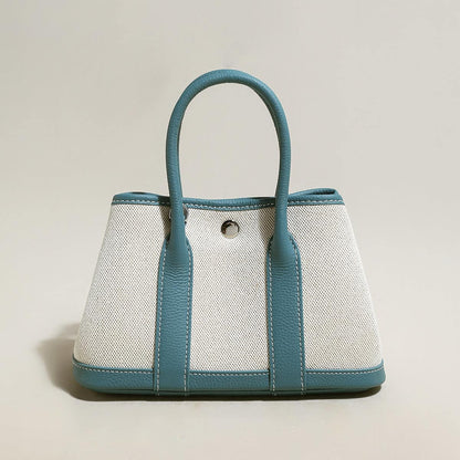 Carefree Canvas and Leather Top Handle Bag