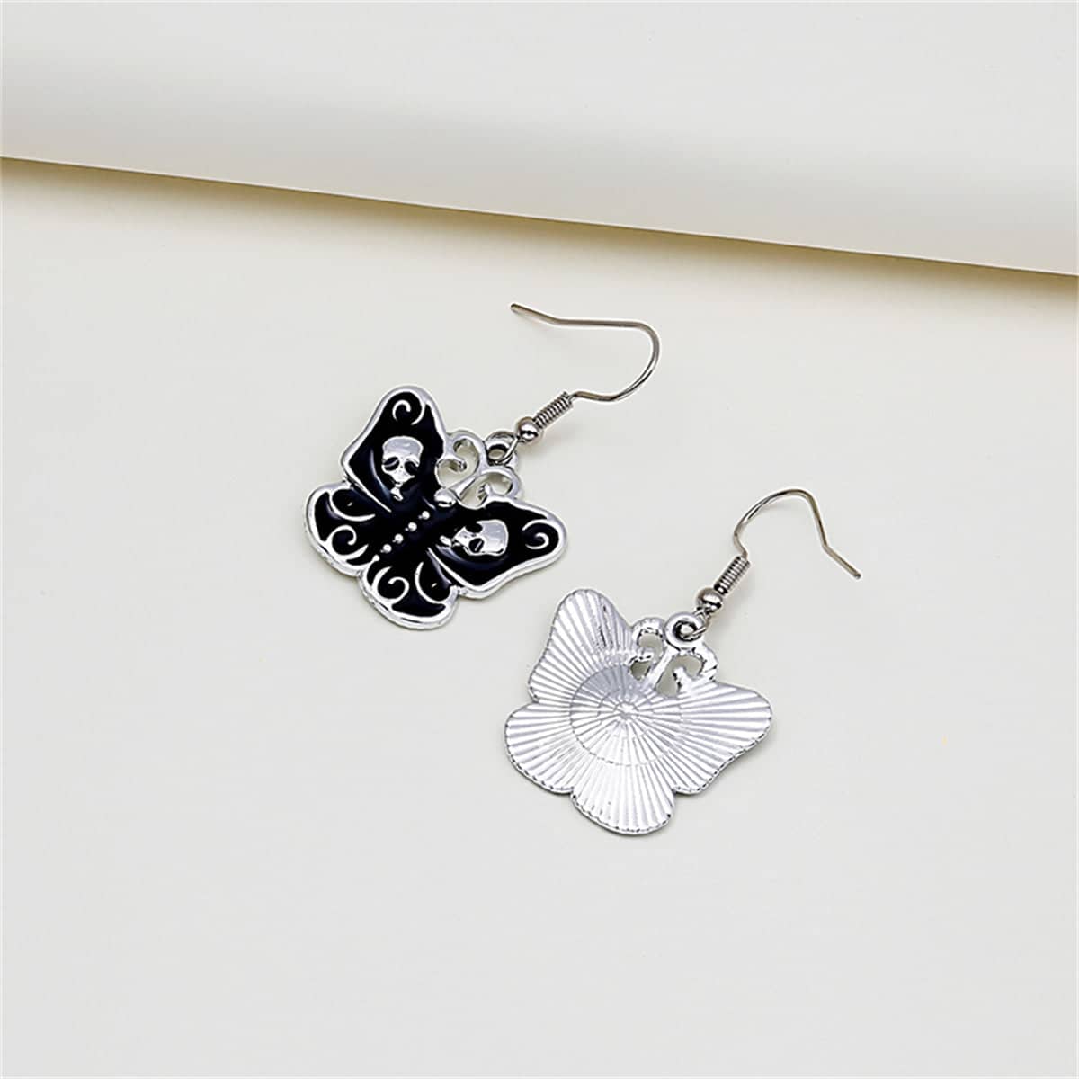 Black & Silvertone Skull Butterfly Drop Earrings