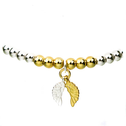 Estella Bartlett Angel Wings Bracelet Set of 2 Silver and Gold Beaded bracelets