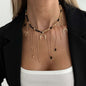 Black Acrylic & Goldtone Moon Pendant Tassel Necklace