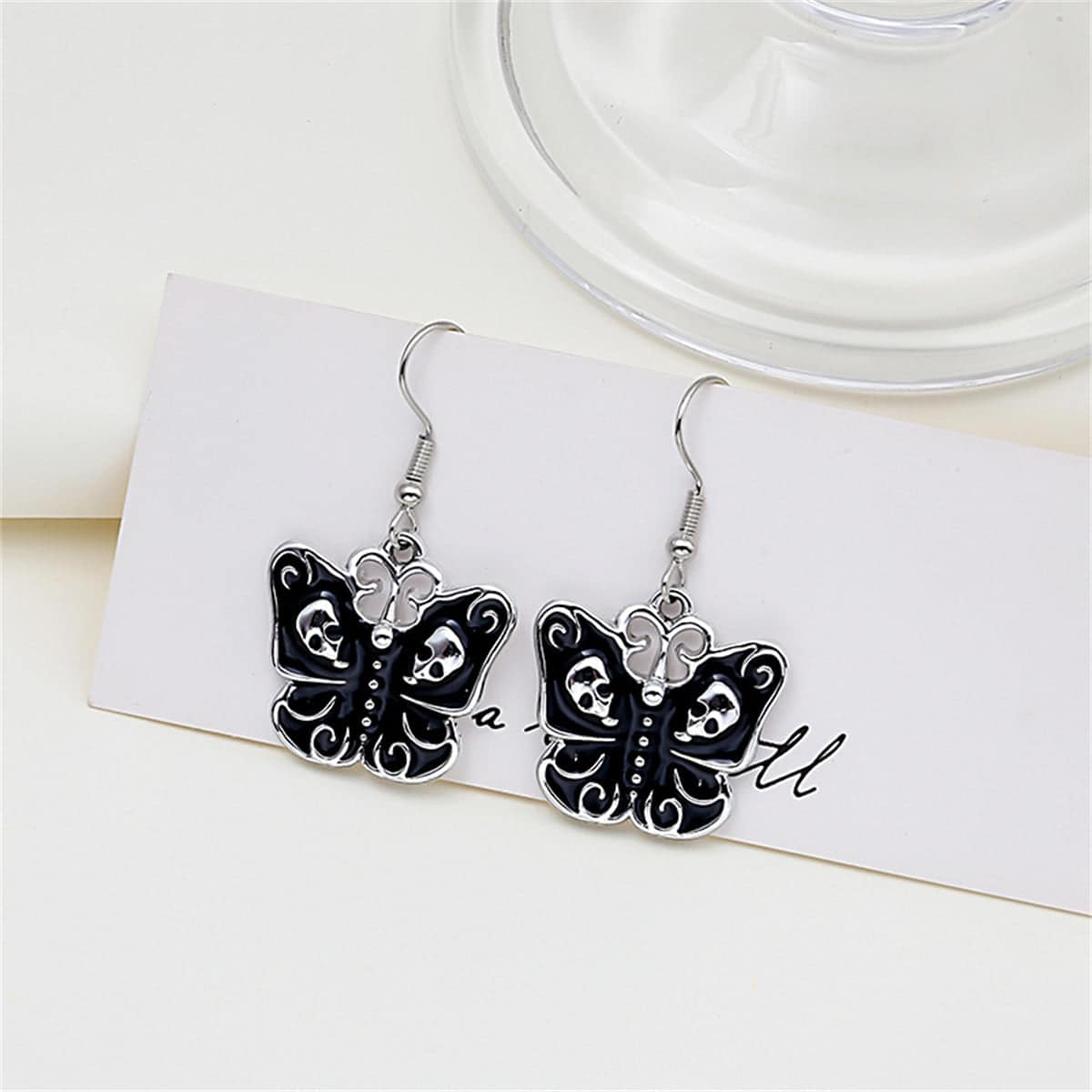Black & Silvertone Skull Butterfly Drop Earrings