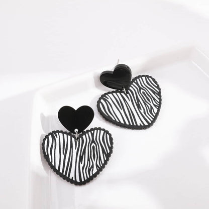 Black Acrylic & Silvertone Zebra Stripe Heart Drop Earrings