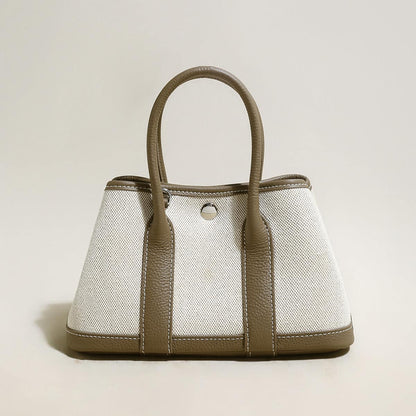 Carefree Canvas and Leather Top Handle Bag