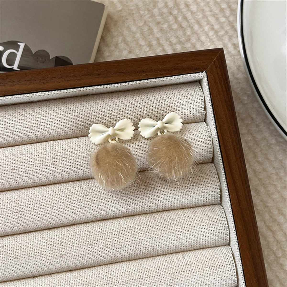 Beige Enamel & Blush Pom-Pom Bow Drop Earrings