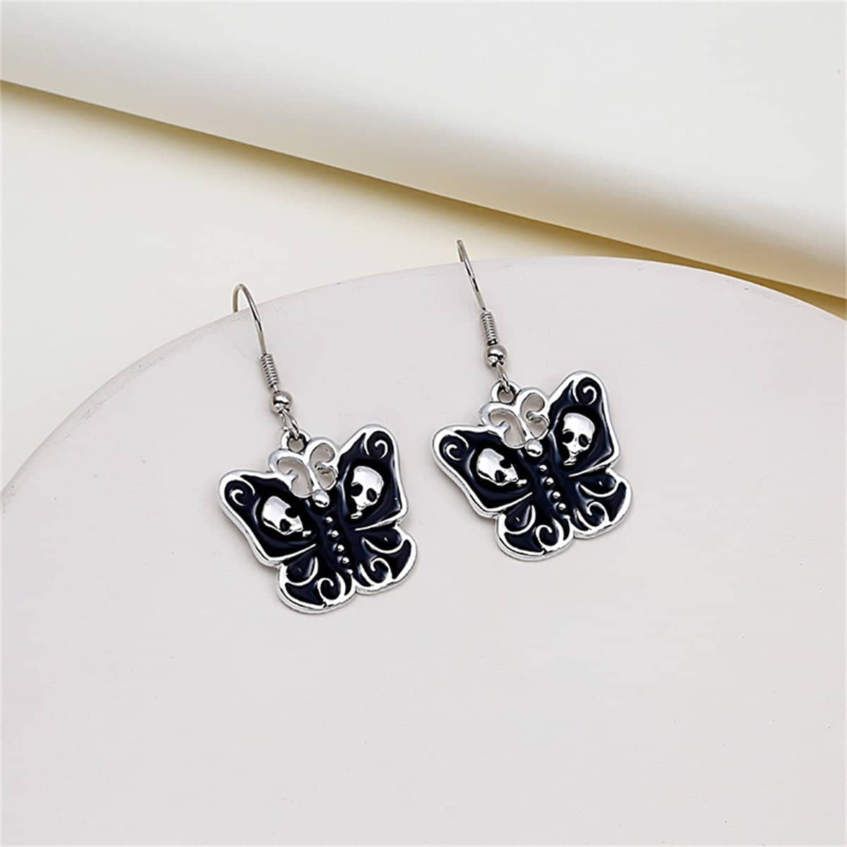 Black & Silvertone Skull Butterfly Drop Earrings