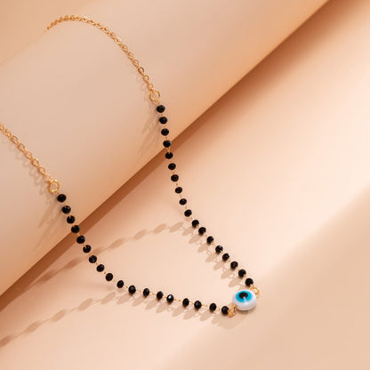Black Acrylic & Goldtone Eye Necklace